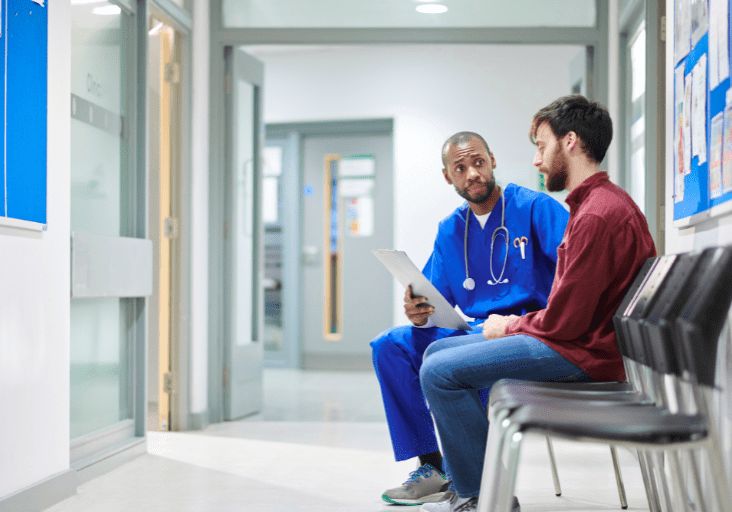 psychiatric nurse helping depressed patient