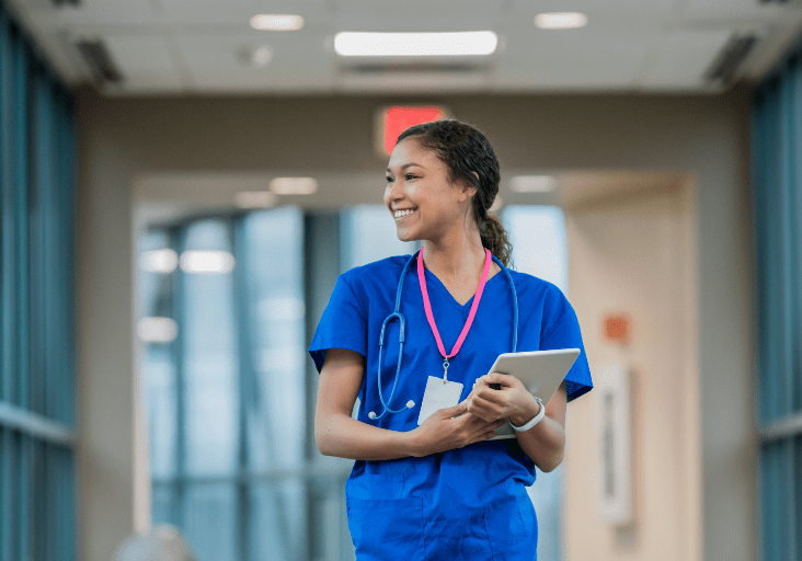 Female registerd nurse with clipboard